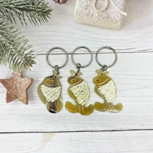Buffalo horn fish keychain — hand-carved, natural horn grain