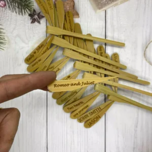 Personalized bamboo dragonfly — balanced on fingertip, natural bamboo